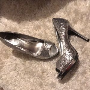 Sparkly silver peep toe pumps